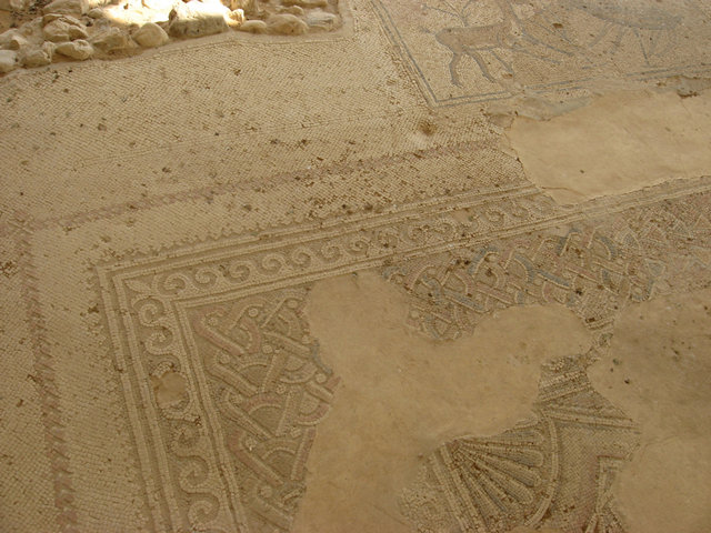 Defaced female figurine at the corner of the mosaic of the Naaran Synagogue north-west of Jericho